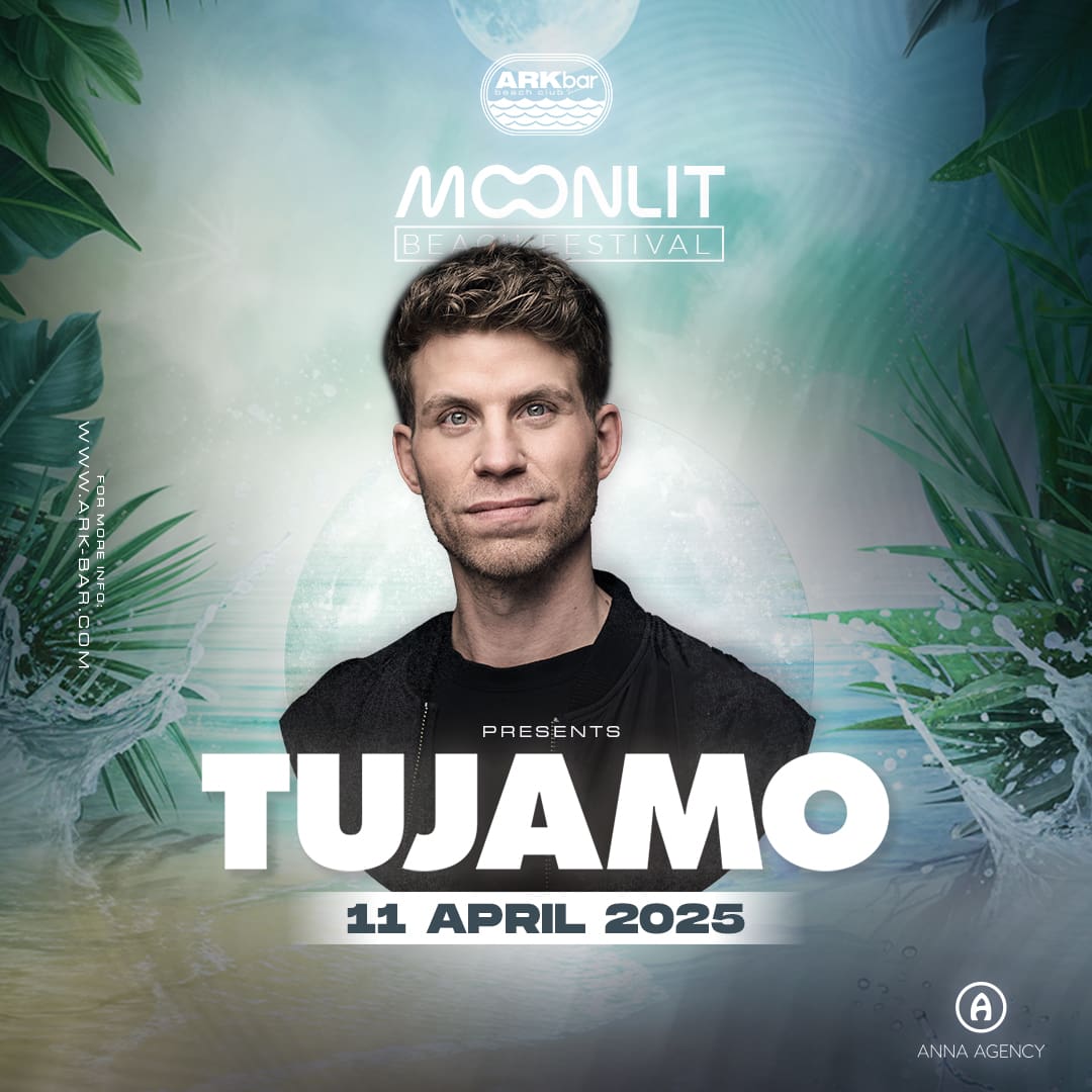Tujamo performing at ARKbar Moonlit Beach Festival on April 11, 2025 under palm trees with tropical beach background