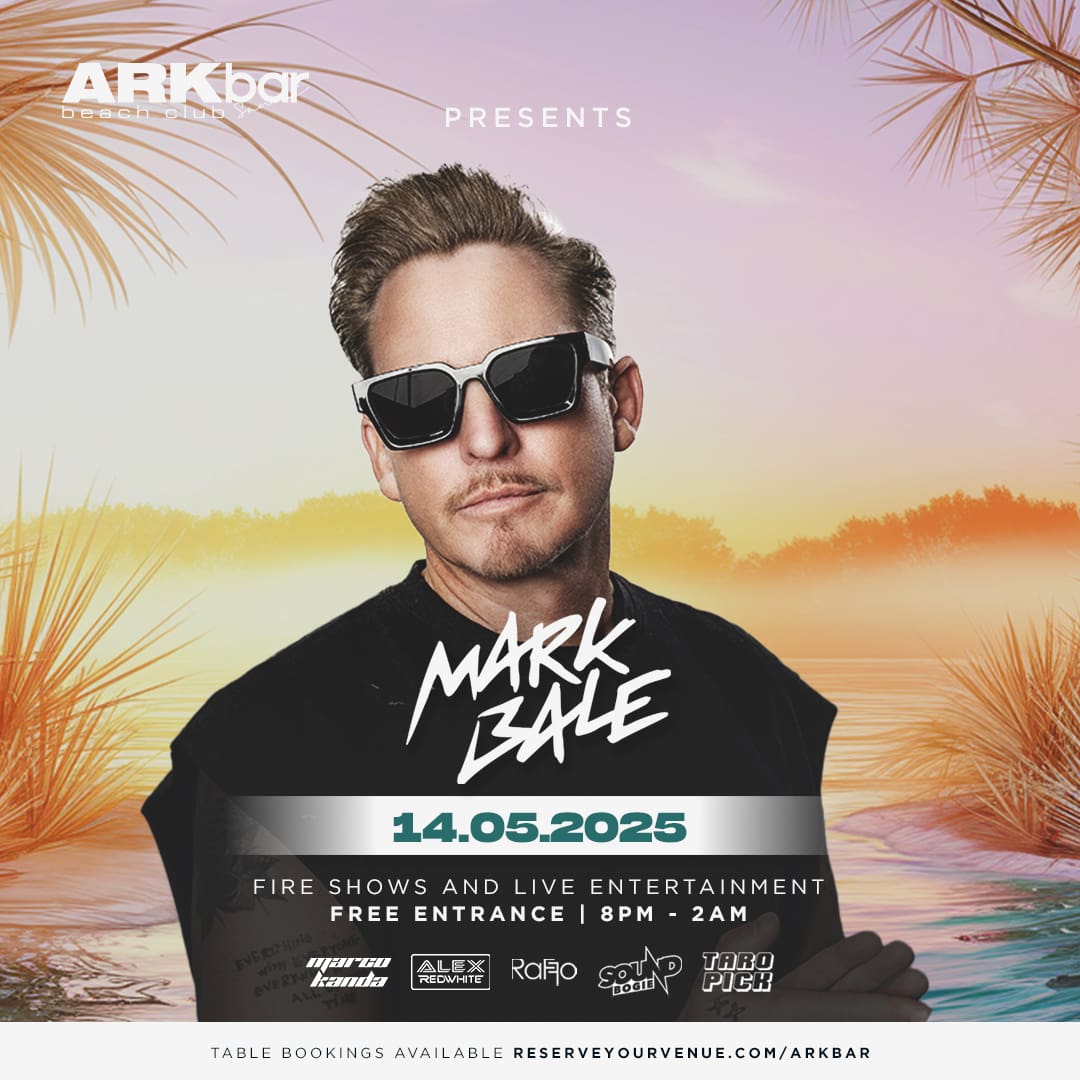 Mark Bale performing live at ARKbar Beach Club on May 14, 2025, in Koh Samui, Thailand, with a vibrant crowd and fire shows